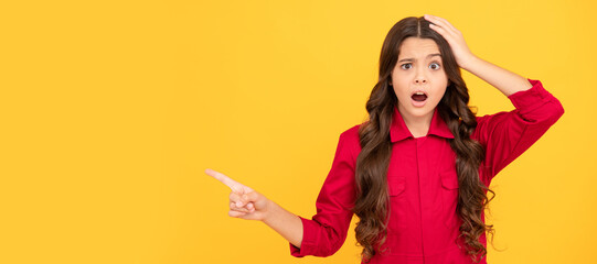 this is unbelievable. shocked kid presenting product on yellow background. child surprised with sale. Child face, horizontal poster, teenager girl isolated portrait, banner with copy space.