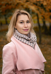 beautiful woman in autumn park 