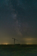Milky way in front of a hungarian landmark, a crane well.