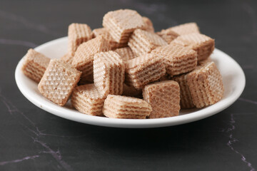 cube shape wafer biscuit on plate 