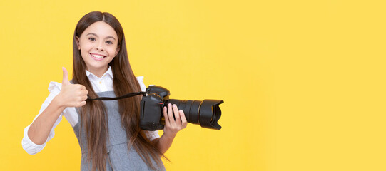 the best. childhood. teen girl taking photo. kid use digital camera. happy child photographing. Child photographer with camera, horizontal poster, banner with copy space.