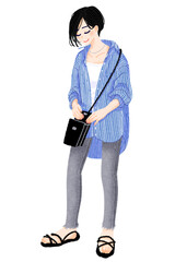 大きめストライプシャツを着た秋コーデの女性