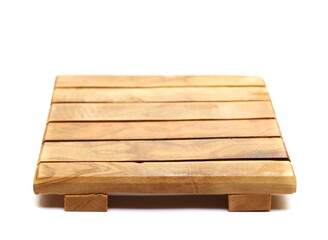 Wooden kitchen pot holder from olive wood isolated on white 