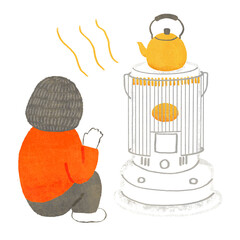 石油ストーブで暖をとる人