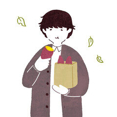 焼き芋を食べる人