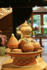 Thai pottery vase set placed on the shelf