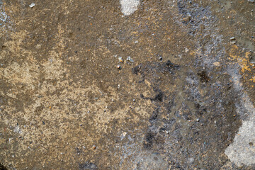 Old plaster background with stains and damage from old age.
