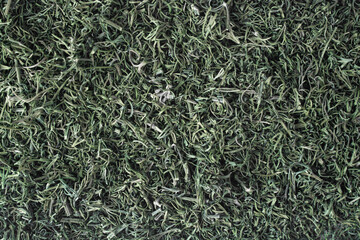 Abstract background of dried dill leaves.