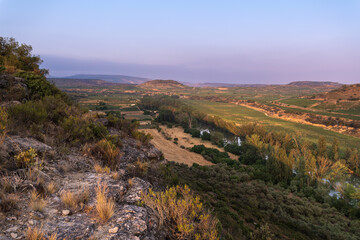 Fototapeta na wymiar Ebro river at sunrise seen from El Cortijo of Logroño, La Rioja, Spain