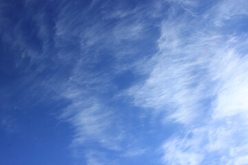 Patterns in the sky made of thin strips of clouds.