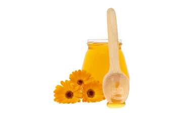 three flowers next to a jar of honey and a wooden spoon on a white background