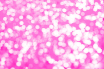 pink sparkles on a purple background. Festive backdrop for your projects.