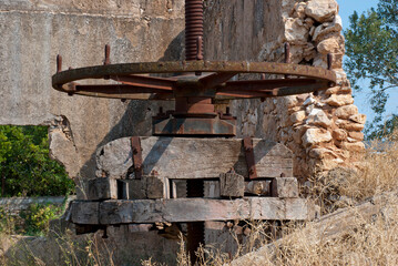 Athens, Greece / July 2022: Wine making facility ruins dating to 1875. Old wine press