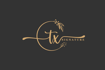 luxury gold signature initial T W logo design isolated leaf and flower