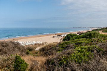 views of La Barrosa beach from the top of the viewpoint called Torre del Puerco in Cadiz, Spain