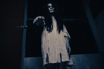 Portrait of asian woman make up ghost,Scary horror scene for background,Halloween festival...