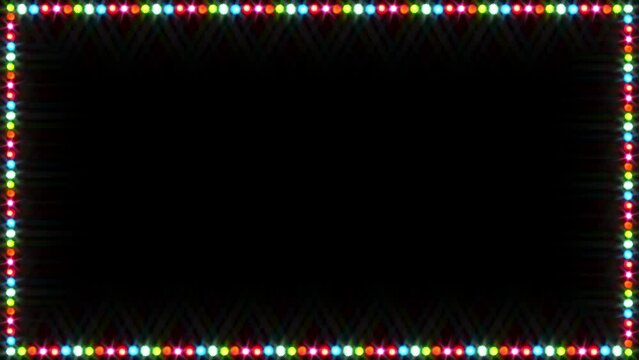 A simple looped slow colour changing twinkling frame border of Christmas or Stage lights against a black background.