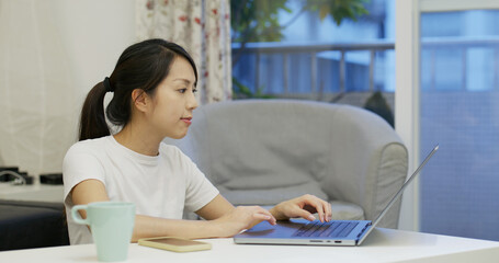 Obraz premium Woman use computer at home