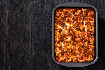 Scalloped Chicken Casserole topped with croutons