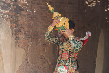 Fototapeta premium Khon ramayana is classic Thai dance in a mask. man artist wearing mask giant