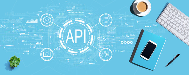 API - application programming interface concept with computer keyboard and office items