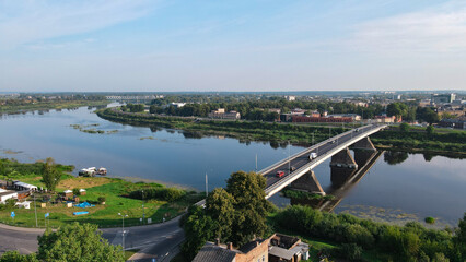 Daugavpils city viev with vienibas bridge on the river Daugava in amazing sunrise time