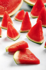 Watermelon slices on a white background.
