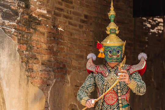 artist man wearing head of giant mask prepare before show dance.Traditional dance drama art of Thai classical monkey mask,This performance is Ramayana Thai Khon epic.