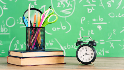 School books and pencils on desk, education concept