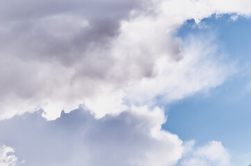 Clouds in the blue sky. Abstract background.