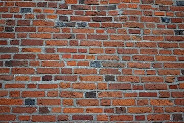old brick wall with black brick texture