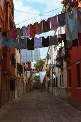 Side street with hanging laundry