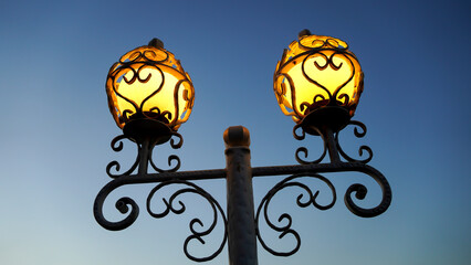Fototapeta na wymiar A decorative street light with blue sky 