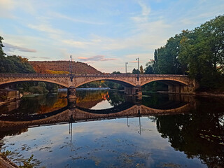Fototapeta premium Besançon, August 2022 - Visit the beautiful city of Besançon at dusk with a sunset 