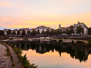 Fototapeta na wymiar Besançon, August 2022 - Visit the beautiful city of Besançon at dusk with a sunset 