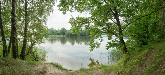 Pastoral landscape on the banks of the lake in Belarus