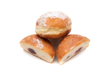 A delicious berliner (berliner donut), isolated on white background. A Berliner is a German donut with no center hole, made of sweet yeast dough fried in fat or oil, with a jam or marmalade filling .