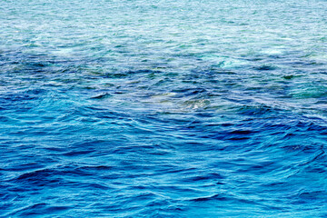 Abstract view to water waves near Sharm el Sheikh from the Red sea
