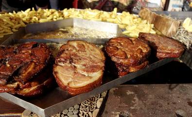 grilled meat and fried potatoes