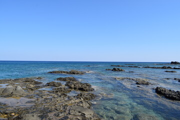 blue sea, sky and rocks