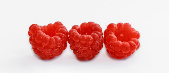 Ripe raspberries isolated on white background cutout 