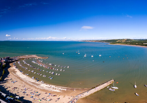 Panoramic View Of The Holiday Resort Town Of New Quay On The West Wales Coast In Mid Summer