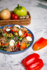 nicoise salad with tuna close-up on the table with vegetables