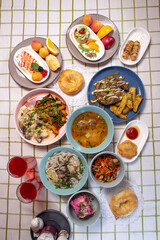 Top view of a table full of food in a cafe
