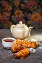 fresh homemade buns with tea on the table