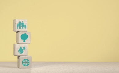 The concept of environmental protection. concrete cube with green economy icons, energy sources....