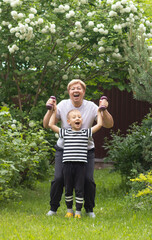 Grandmother and grandson go in for outdoor sports. Concept of interaction between generations and a healthy lifestyle