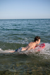 A 17 Year Old Teenage Boy In The Sea