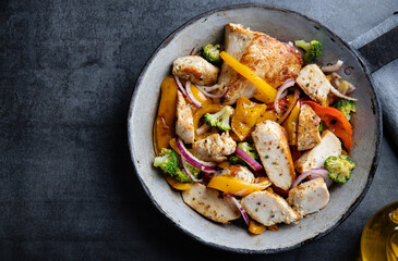 Chicken with vegetables in bowl