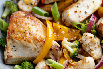 Chicken with vegetables in bowl
